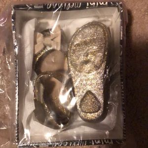 Mini Melissa gold Mary Janes with bows